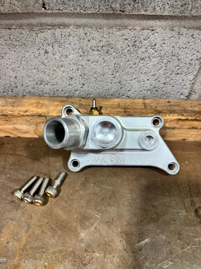 Ktuned upper coolant housing
