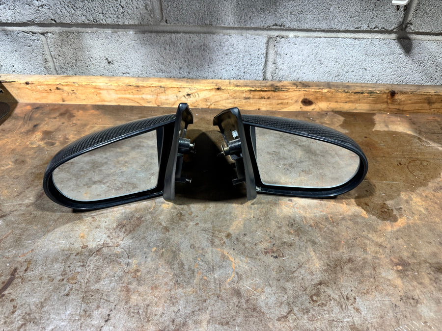 Spoon style mirrors
